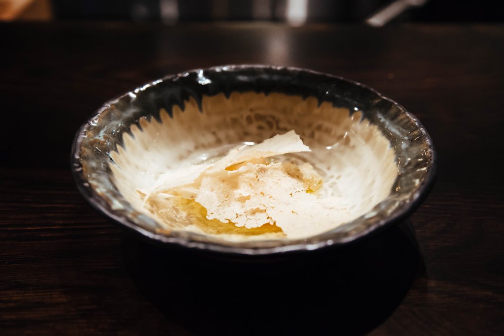 Crudo—potato paper, scallop, truffled butter and yuzu salt